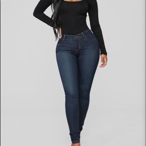 FASHION NOVA MID RISE DARK DENIM JEANS